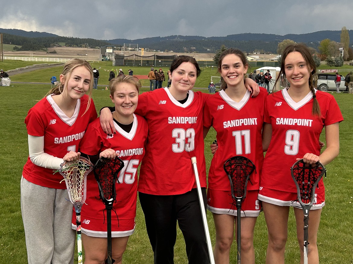 The 2024 Sandpoint girls lacrosse senior players are all smiles after defeating Mead on Wednesday. From left, Cassidy Aitken, Kayla Bers, Eva Sloan, Rowan Davis, and Terra Bode.