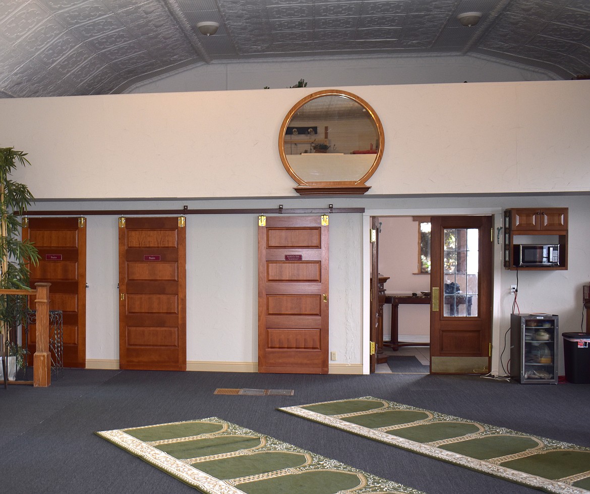 The Moses Lake Islamic Center installed carpet over the original floor in its new building, but retained much of the original woodwork, as well as the steel-tile ceiling. There was a steeple at one time, the building’s owner Gail Adair said, but it was removed decades ago during repairs and never returned.