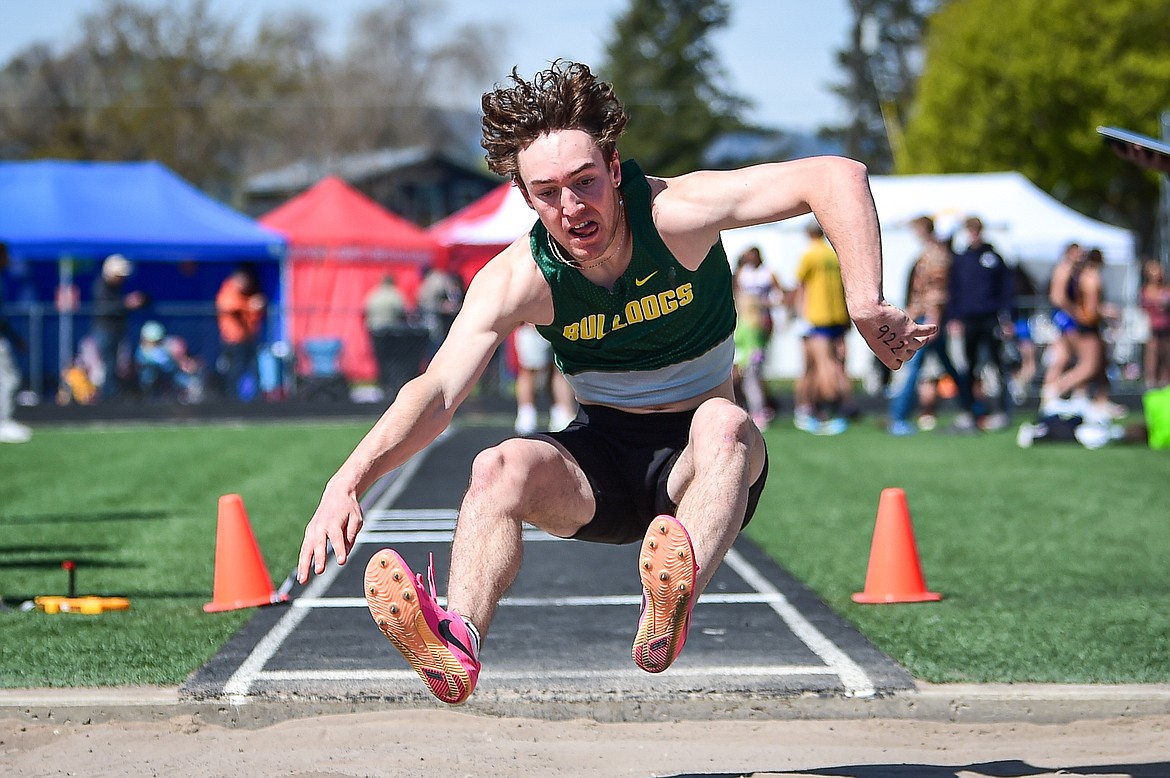 Whitefish's Christian Schwaderer competes in the boys long jump at the Archie Roe Invitational at Legends Stadium on Saturday, May 4. (Casey Kreider/Daily Inter Lake)