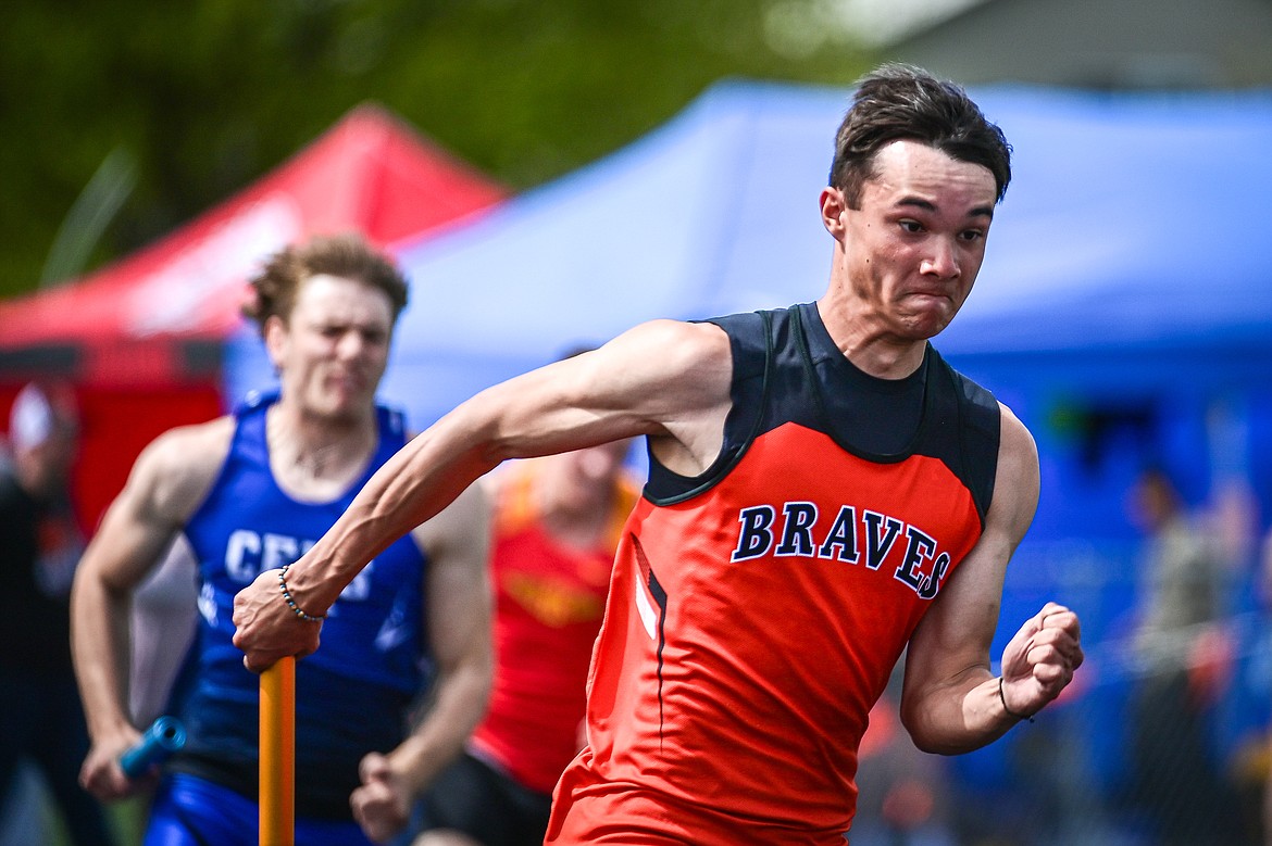 Flathead's Jacob Dolezal runs the first leg of the boys 4x100 relay with teammates  William Hollensteiner, Ben Bliven and Brody Thornsberry at the Archie Roe Invitational at Legends Stadium on Saturday, May 4. (Casey Kreider/Daily Inter Lake)