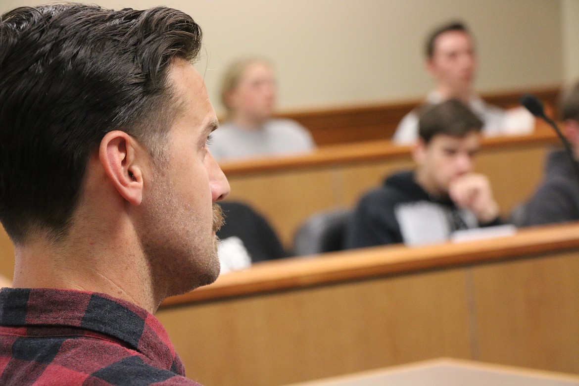 C. Banjo Patterson (played by Sandpoint High School teacher Conor Baranski) and members of the mock jury listen to the judge during a mock trial held as part of a Law Day education event on Wednesday. The pretend trial and a companion civil law presentation were designed to teach students about the law.