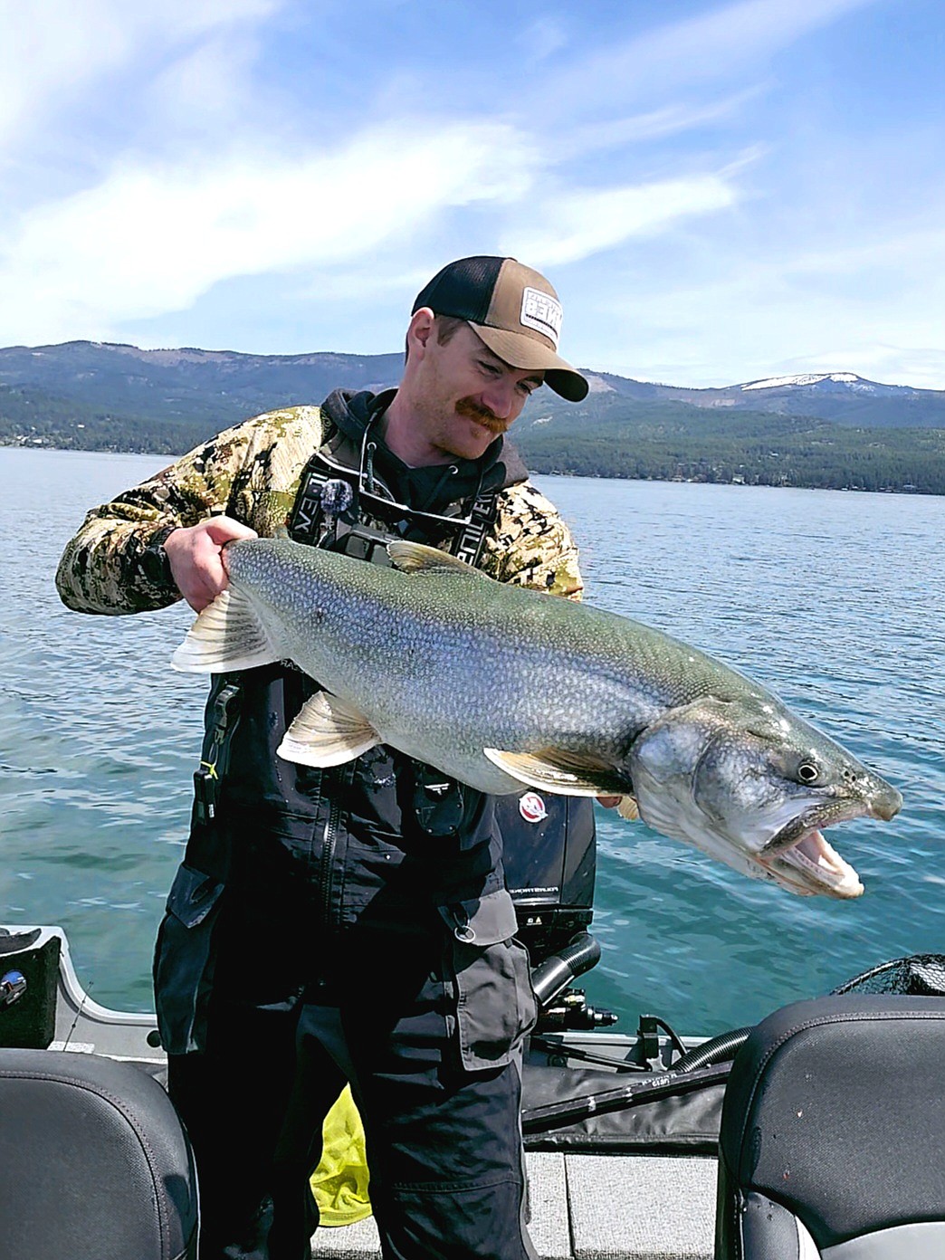 Cole Williams of Kalispell with a large lake trout that he released back into Flathead Lake during the Spring Mack Days fishing event. (Photo provided)