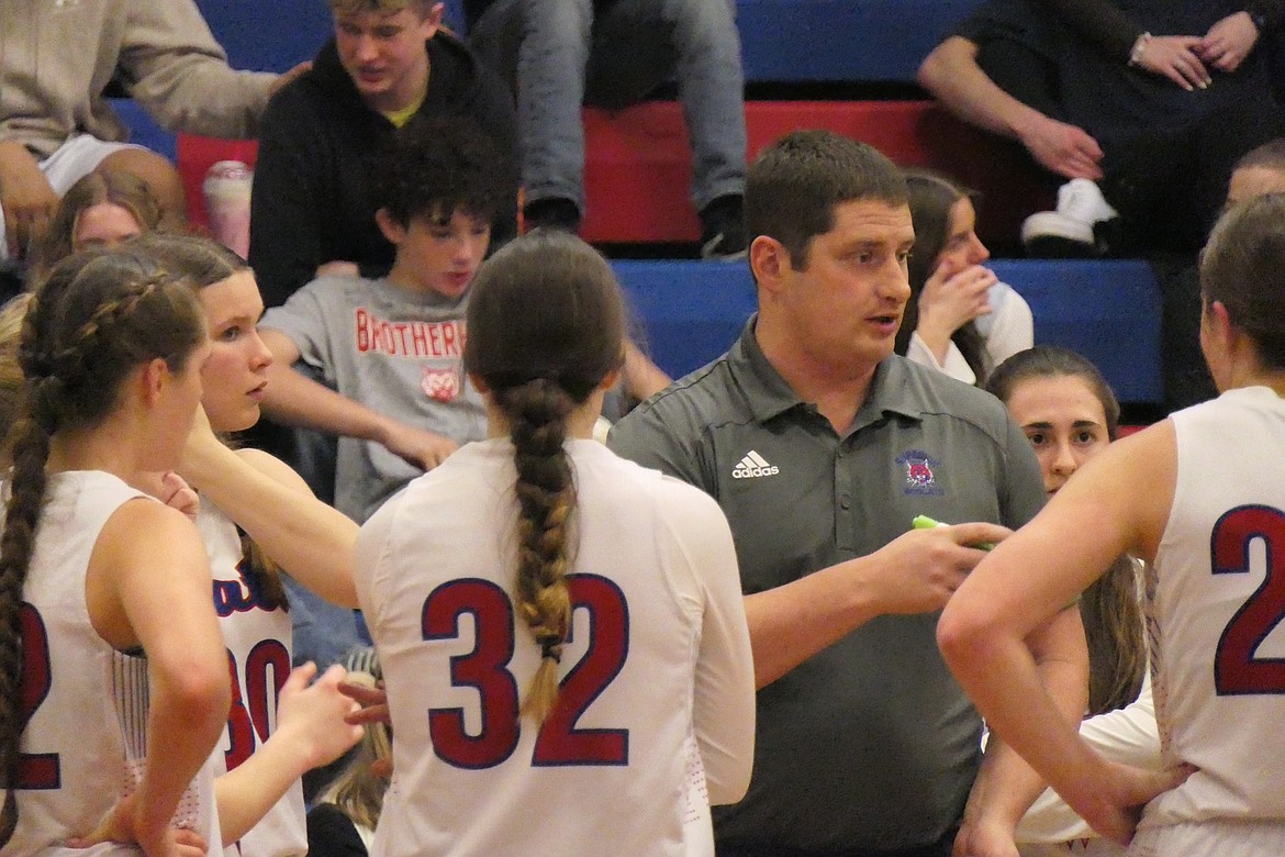 Superior girls basketball coach Jeff Schultz talks to his team during a game earlier this year in Superior.  The Bobcats will be moving back to Class C in basketball, volleyball and track beginning next fall. (File photo)