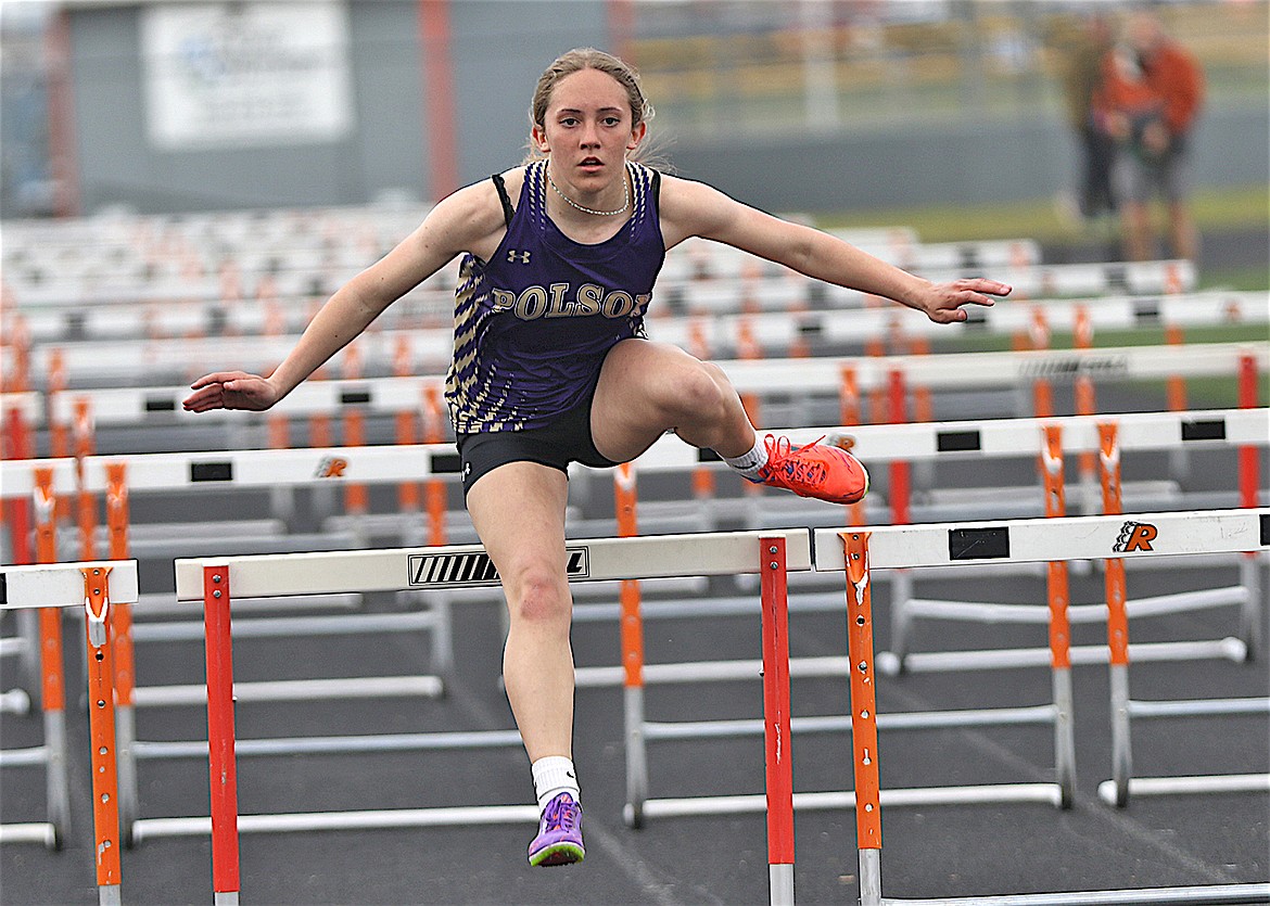 Polson’s Ross Bishop won the 100-meter hurdles during last week's all-county track event. (Bob Gunderson photo)
