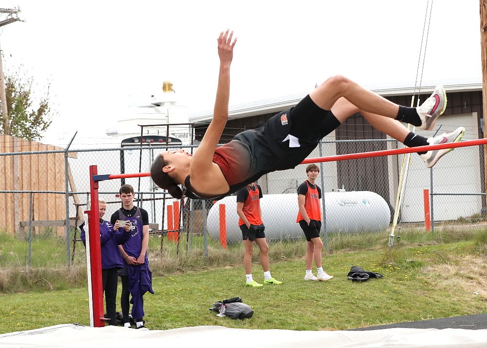Ronan's Tayen Edmo clears the bar in the high jump during last week's track meet in Ronan. (Susan Lake photo)