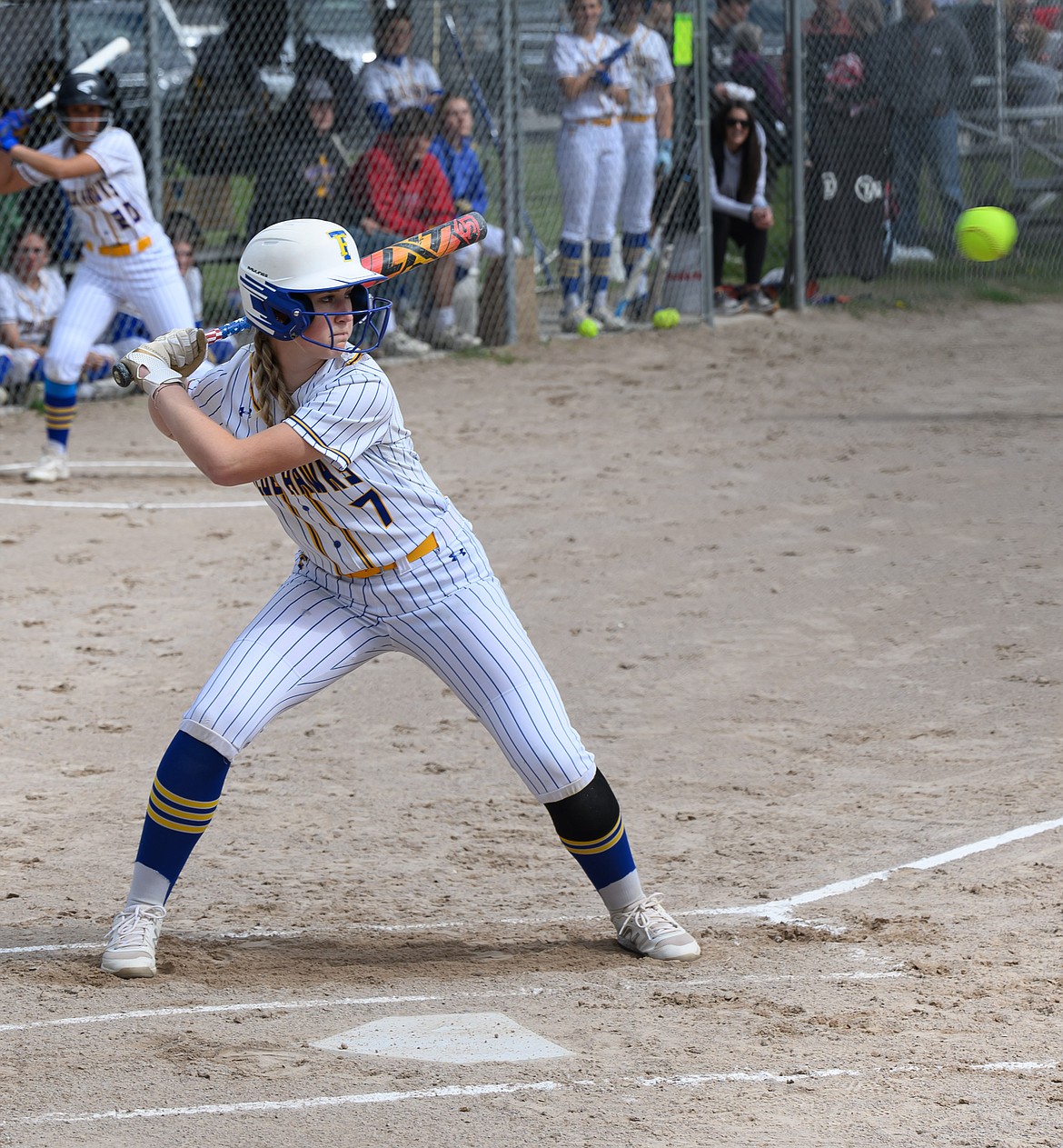 Lady Hawks sophomore Gabi Hannum sizes up an incoming pitch during T Falls' game this past Thursday with Sanders County rival Plains. (Photo by Tracy Scott)