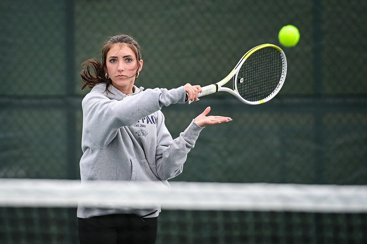 Glacier's Leilani Lennarz hits a return in a girls singles match against Flathead's Elle Westover at Flathead Valley Community College on Tuesday, May 7. (Casey Kreider/Daily Inter Lake)