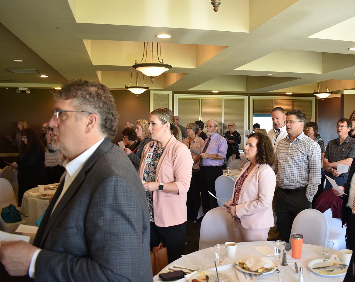 Attendees at the Moses lake Mayor’s Prayer Breakfast sing a medley of hymns and praise songs Tuesday morning.