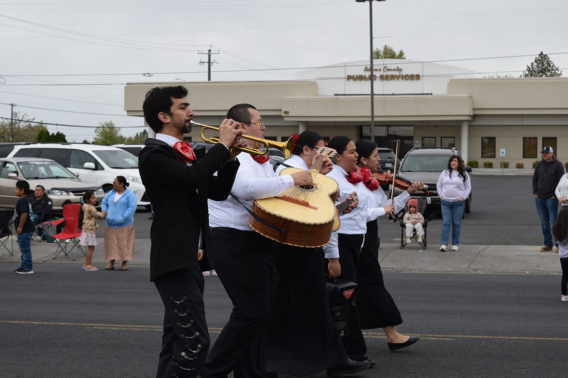 A band plays music during the Cinco de Mayo parade Saturday morning in front of Othello City Hall on Main Street before community members congregated in Lions Park for festivities throughout the day.