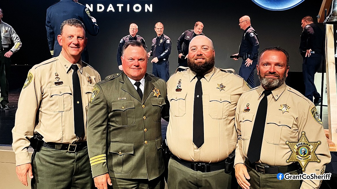 From left to right, Undersheriff John McMillan, Sheriff Joey Kriete, Det. Korey Judkins and Chief Deputy Gary Mansford of the Grant County Sheriff’s Office pose during proceedings at the Washington Capitol wherein Judkins received an award recognizing his bravery in the line of duty.