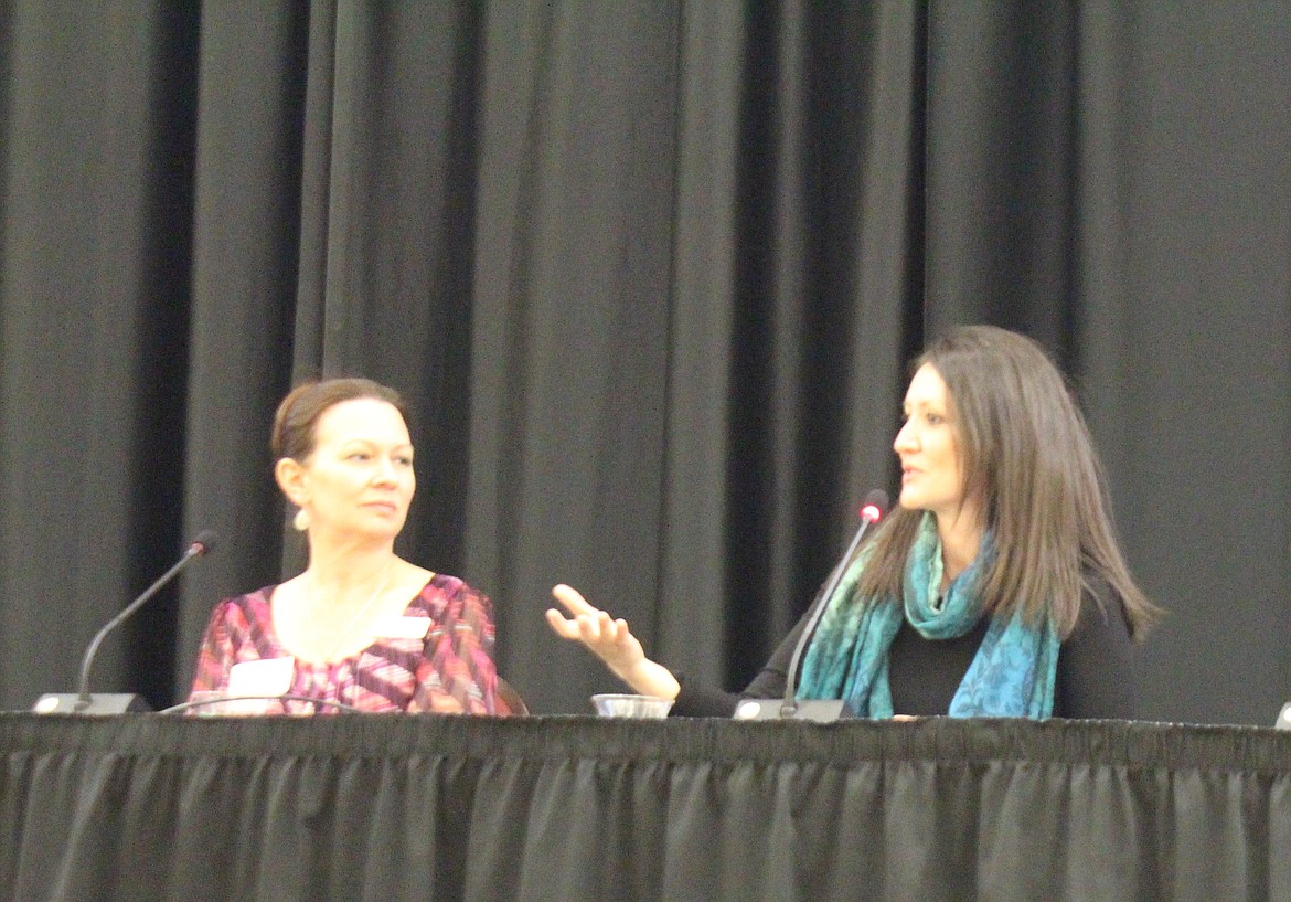 From left, Roslyn Moes and Claudia Wright discussed the challenges faced by immigrants and employers in the labor market during the Economic Outlook Conference at Central Washington University Monday. The pair was joined by Jon DeVaney, not pictured.