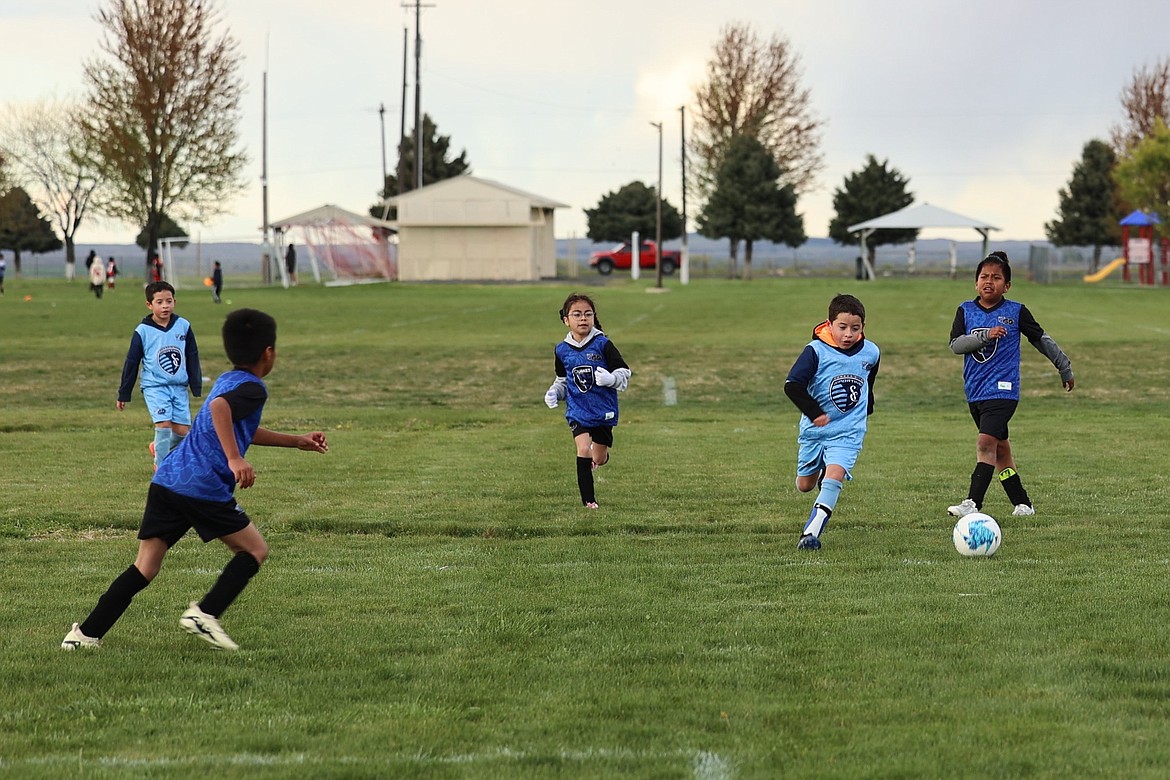 Othello children play soccer at P.J. Taggares Park during this spring’s Major League Soccer GO season. Soccer will be one of the activities offered during Othello’s youth summer recreation program in June and July, which was approved during Monday’s regular council meeting.