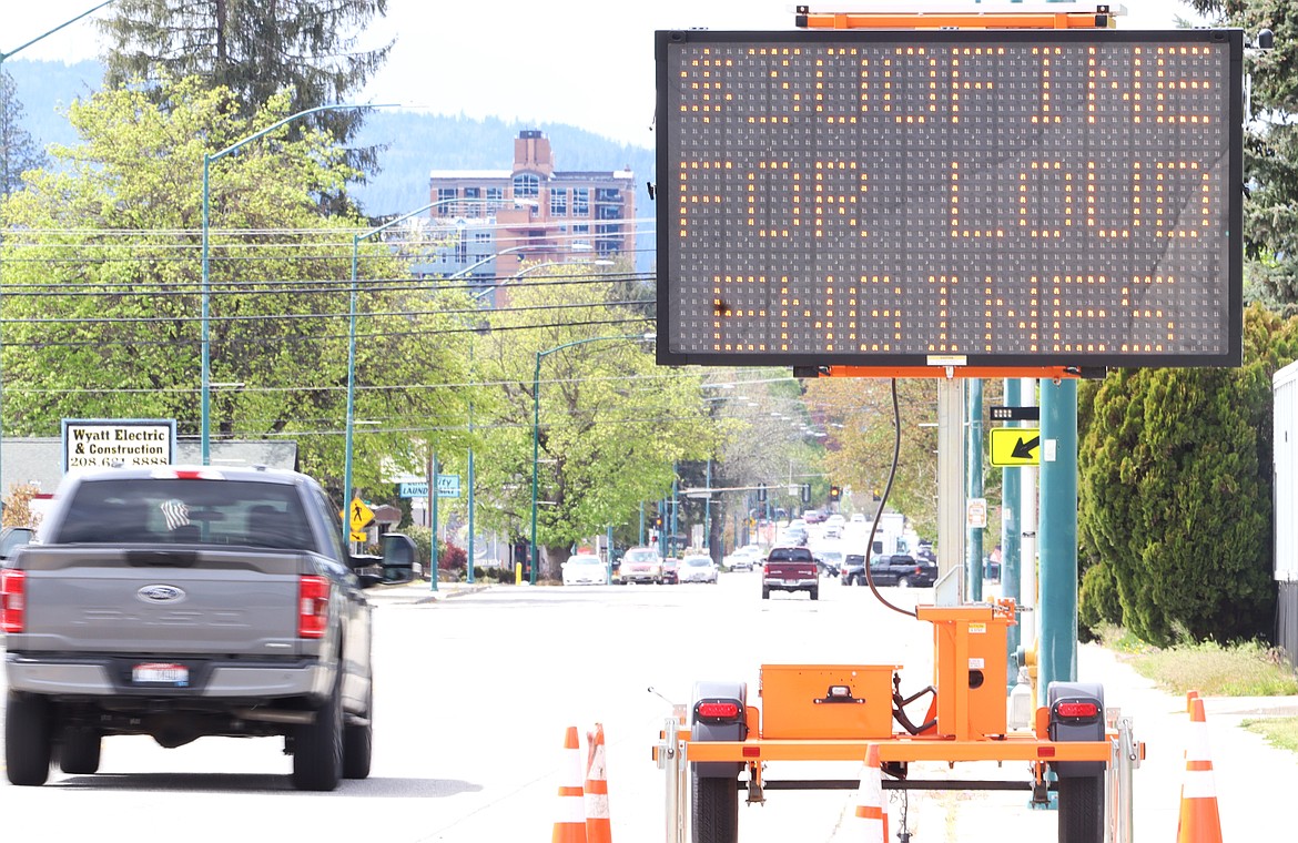 A Coeur d'Alene electronic sign on Sherman Avenue warns drivers of fines for loud engines on Tuesday.