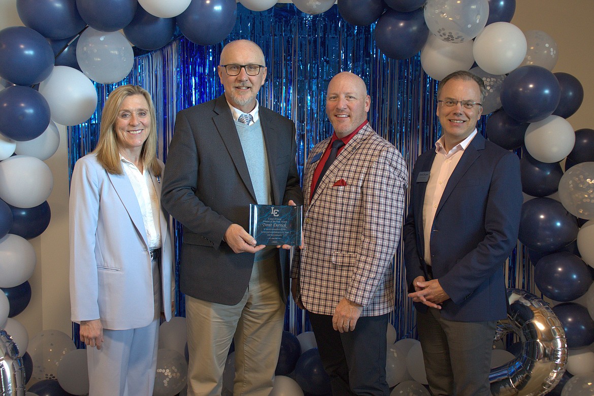 Coeur d'Alene School District Assistant Superintendent of Secondary Education Trent Derrick was honored Friday during a ceremony celebrating him as Lewis-Clark State College's 2024 Alumnus of the Year. From left: Lewis-Clark State College President Cynthia Pemberton; Derrick; Fredrick Chilson, provost of LC State; and Rocky Owens, senior director, LC State, Coeur d’Alene Center.