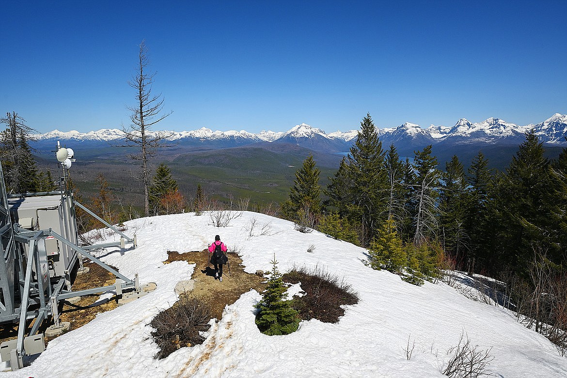 Kari G. of Kalispell enjoys the expansive views offered at Apgar Lookout in Glacier National Park.