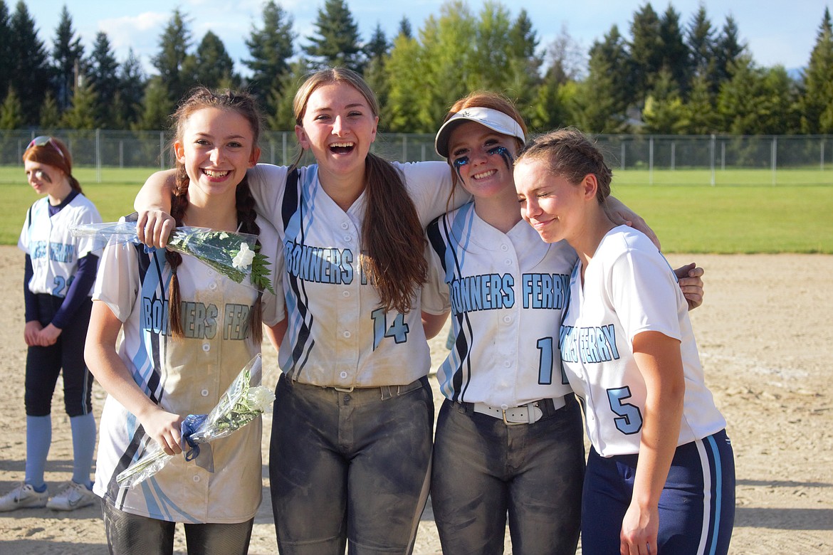 Badger senior softball players at Senior Night (left) Jada Fairchild, Taylor Sumpter, Ava Frederickson and Jodee Curtis.