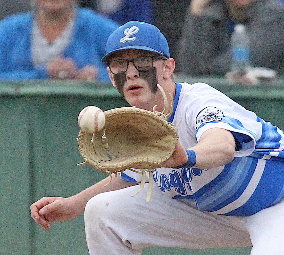 Libby Loggers first baseman Tanner Wolfe receives a throw to keep a baserunner close to the bag during the Wood Bat Classic 2024. (Paul Sievers/The Western News)