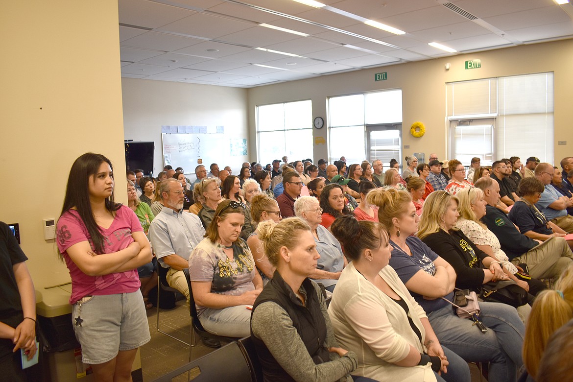 Community members fill the Moses Lake School District boardroom to capacity Thursday. Many expressed support for CBTECH Director Christine Armstrong who has been absent from campus. Others were concerned about likely budget cuts after the MLSD Educational Programs & Operations levy election failed recently.