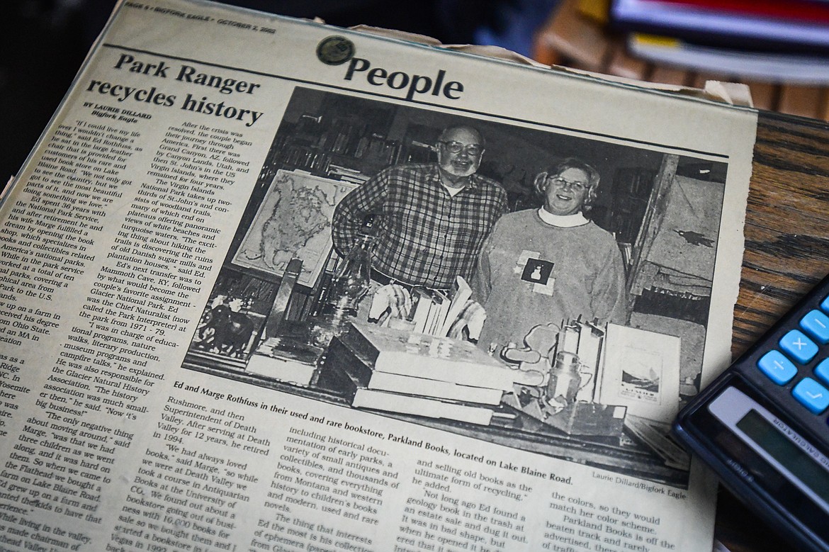 An old Bigfork Eagle newspaper clipping from October 2002 featuring a photo of Ed and Marge Rothfuss, owners of Parkland Books. (Casey Kreider/Daily Inter Lake)