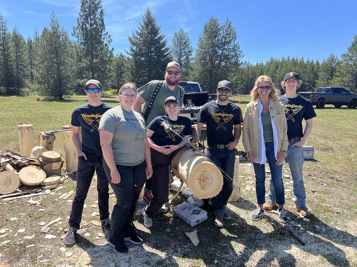 The Vandal Jacks, a competitive lumberjack team from the University of Idaho, showed students the skills of using saws and axes Thursday at the forestry contest. From left: Spencer Stenmark, Josey Bouhanna, Nick Barrett, Ella Carroll, Chris Rau, Idaho Superintendent of Public Instruction Debbie Critchfield and Sam Bernard.