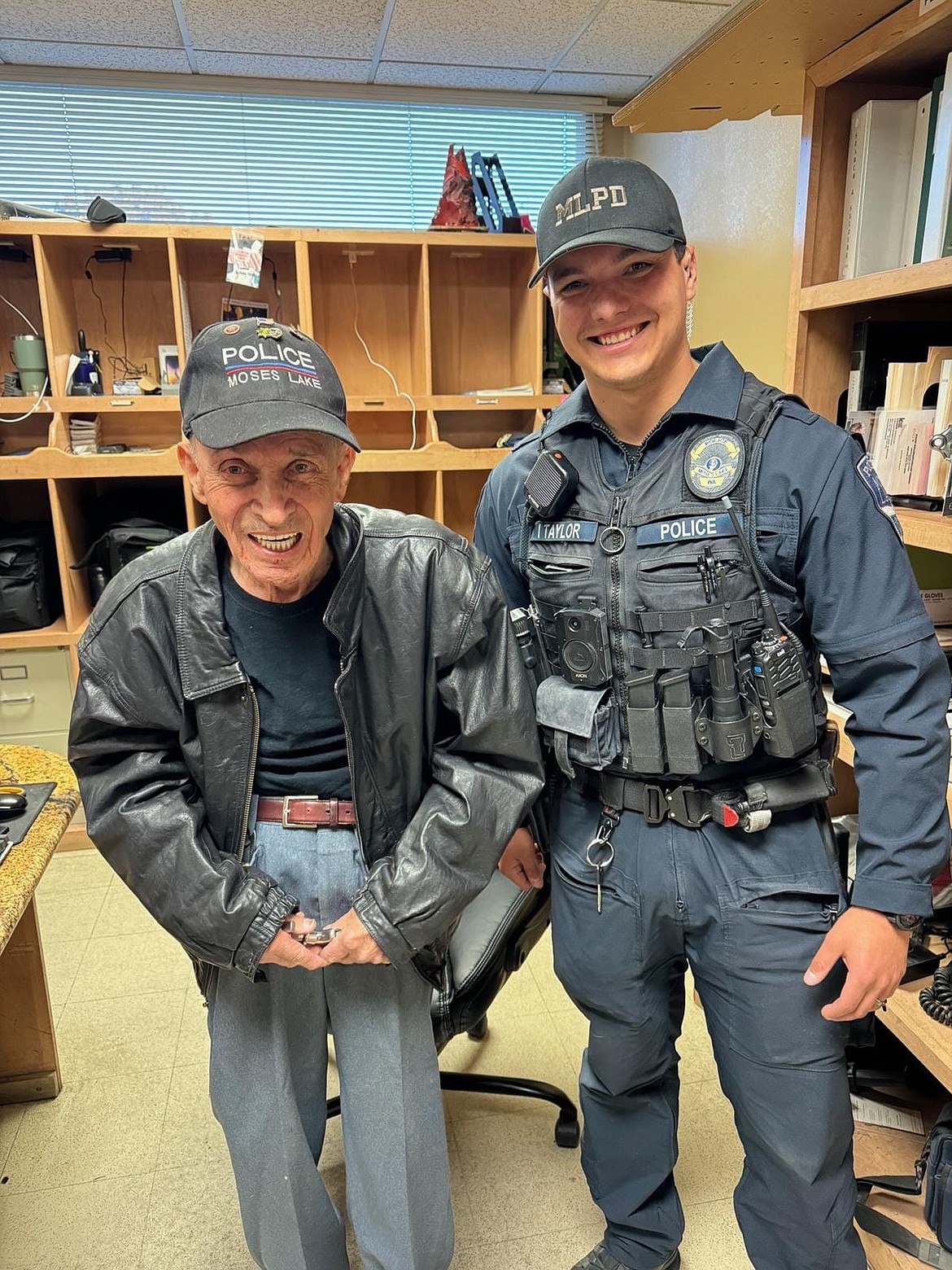 Retired Moses Lake Police Officer Ralph Rodgers, left, celebrated his 93rd birthday Wednesday by paying a visit to the MLPD station and hanging out with the current crop of officers, including Ofc. Isaac Taylor.