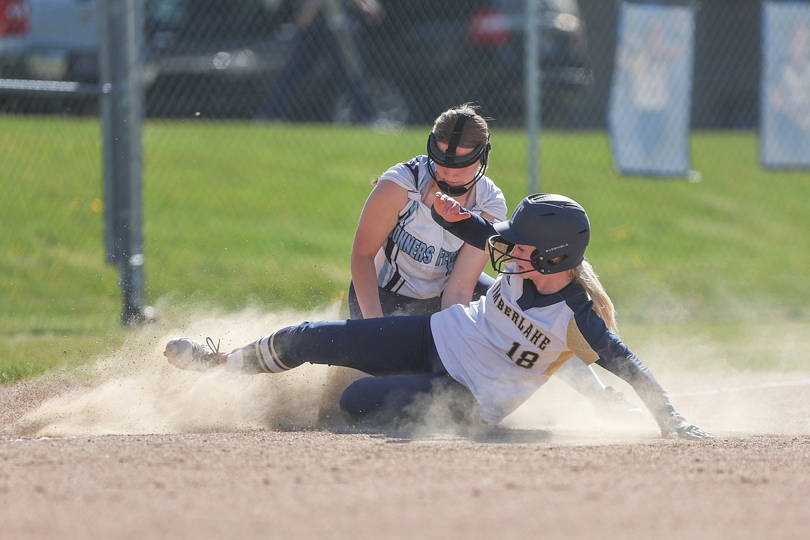 JASON DUCHOW PHOTOGRAPHY
Marissa Needs of Timberlake slides safely into third base as Bonners Ferry third baseman Jaydin Falck covers Thursday in Spirit Lake, in Game 2 of a best-of-3 series for the 3A District 1 softball title.