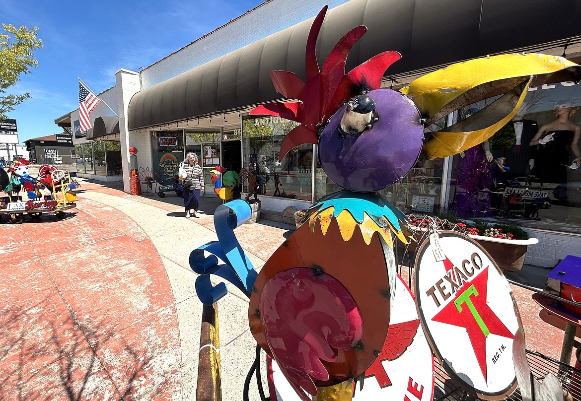 Sunny skies greet a customer leaving Looking Glass on Fourth Street in Coeur d'Alene on Thursday.