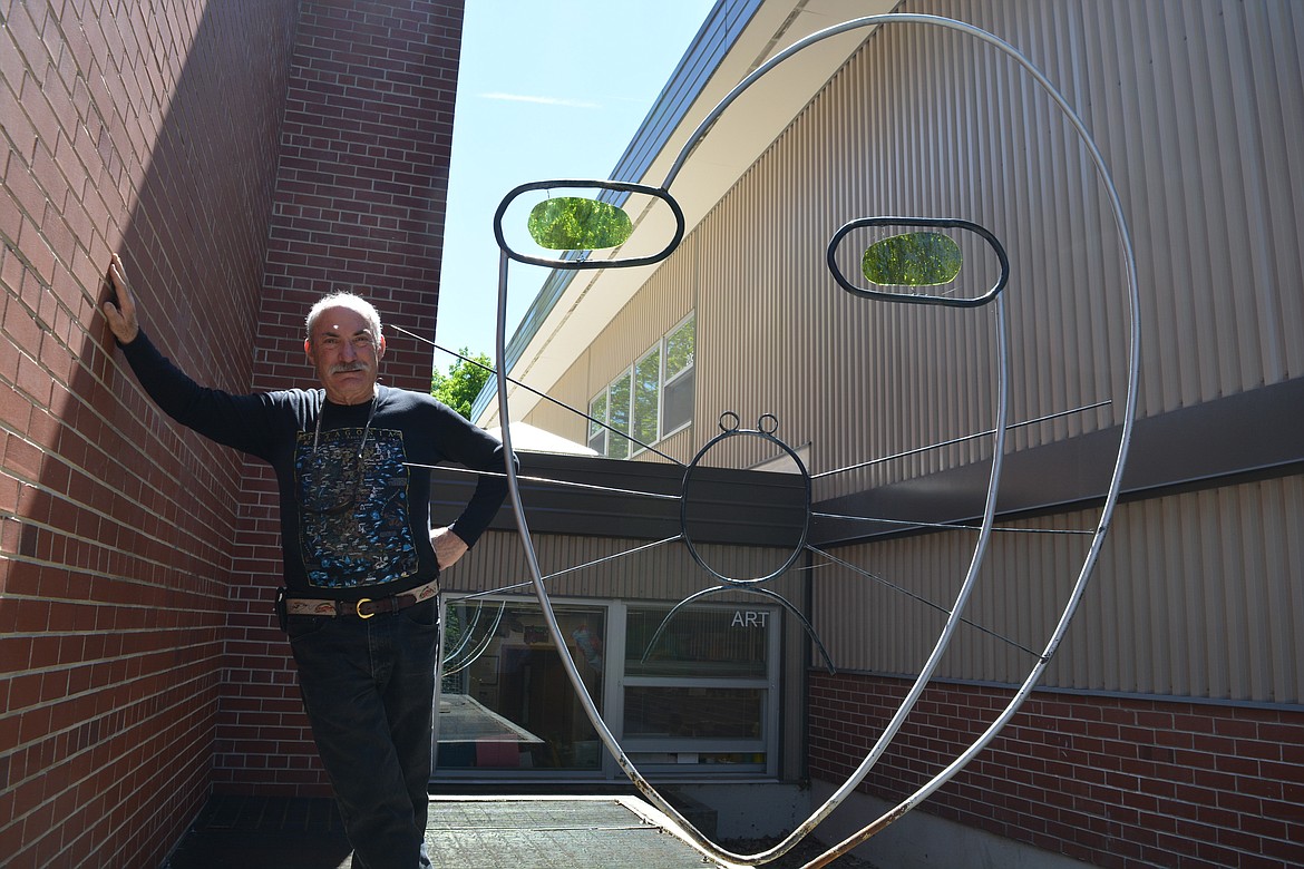 Artist Buddy Paul's sculpture, " Very Large Cat," will be visible from the window from the art classroom at Sorensen Magnet School of the Arts and Humanities.