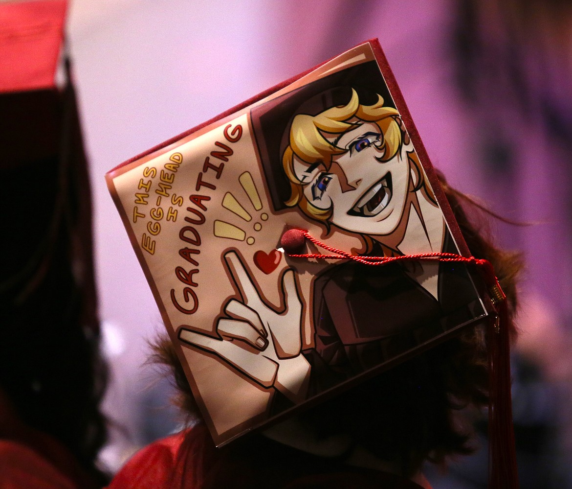 "This egg-head is graduating!" reads world languages major MacKenzie McDermott's decorated mortarboard, which she rocked Friday morning at graduation.