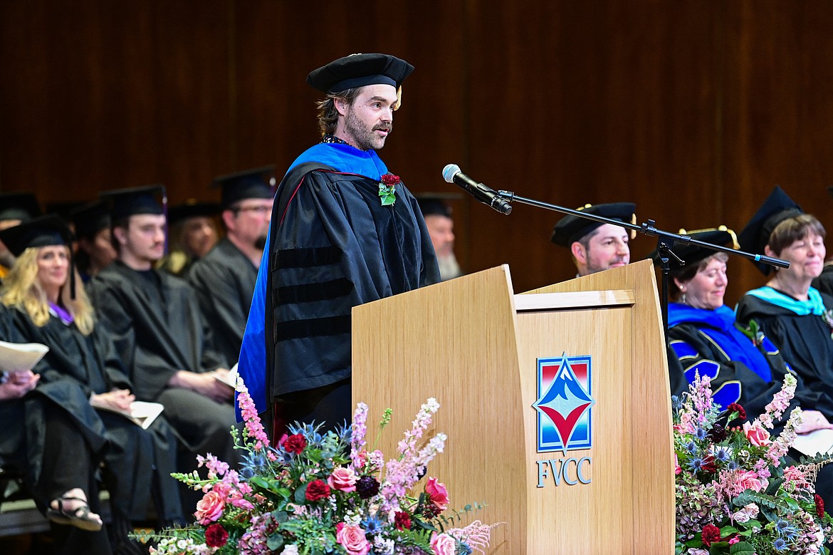 Charles Katerba, faculty in the Math and Computer Science Division, addresses the crowd at Flathead Valley Community College's Class of 2024 commencement ceremony inside McClaren Hall at the Wachholz College Center on Friday, May 10. A total of 271 students were honored earning 292 degrees and certificates. (Casey Kreider/Daily Inter Lake)