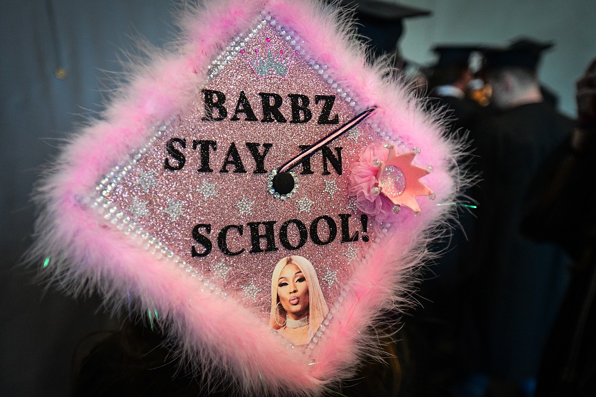 A graduate's decorated mortarboard reads "Barbz stay in school!" before Flathead Valley Community College's Class of 2024 commencement ceremony inside McClaren Hall at the Wachholz College Center on Friday, May 10. A total of 271 students were honored earning 292 degrees and certificates. (Casey Kreider/Daily Inter Lake)