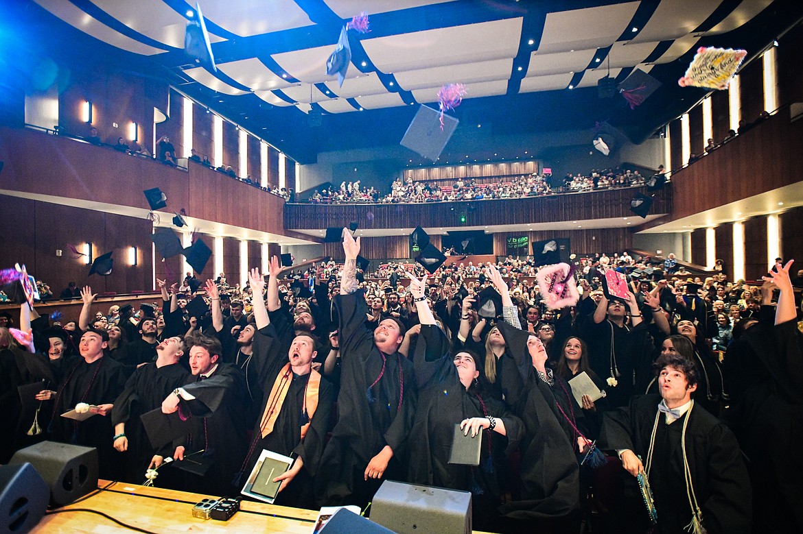 Graduates toss their mortarboards into the air after Flathead Valley Community College's Class of 2024 commencement ceremony inside McClaren Hall at the Wachholz College Center on Friday, May 10. A total of 271 students were honored earning 292 degrees and certificates. (Casey Kreider/Daily Inter Lake)