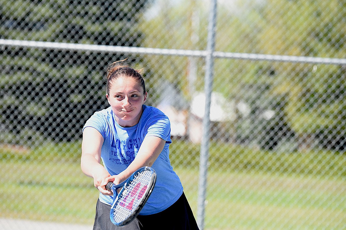 Libby's Riley Lisle returns a shot against Ronan Saturday, May 11, 2024. (Scott Shindledecker/The Western News)