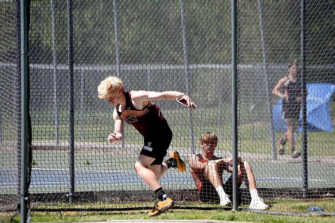 Troy's Seth Newton competes in the discus in the District 7B Meet Saturday, May 11, 2024 in Libby. (Scott Shindledecker/The Western News)