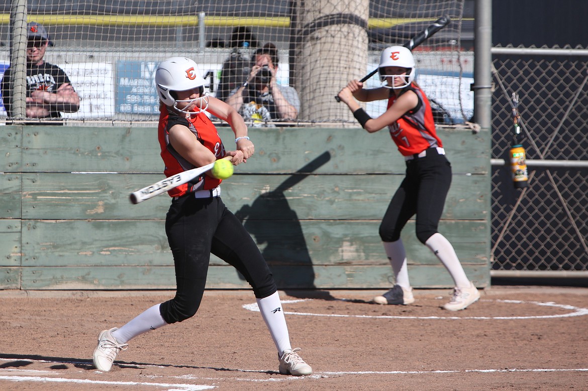 Ephrata junior Tori Falconer, left, connects with a pitch for a single in the bottom of the second inning against Prosser on Thursday.