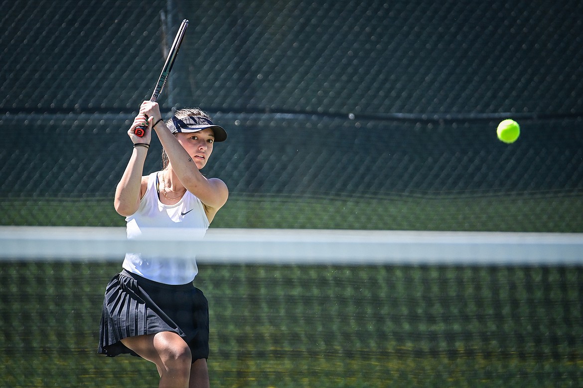 Whitefish's Alivia Lusko hits a return in a girls singles match against Bigfork's Jade Sisler at Grouse Mountain Park in Whitefish on Thursday, May 9. (Casey Kreider/Daily Inter Lake)