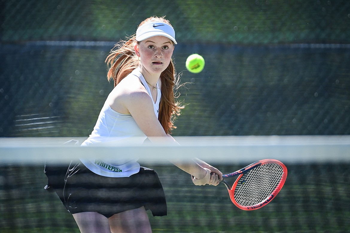 Whitefish's Liesl Brust hits a return in a match against Bigfork's Tessa Troyer at Grouse Mountain Park in Whitefish on Thursday, May 9. (Casey Kreider/Daily Inter Lake)