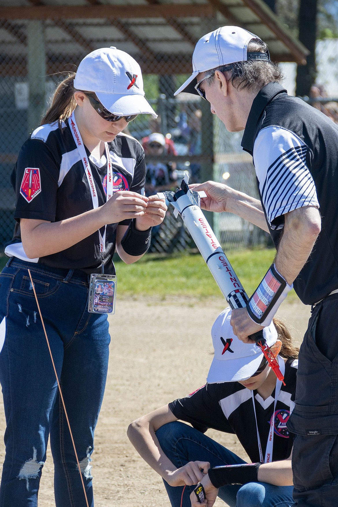 Students help prepare, launch, and repair rockets during the half-day event.