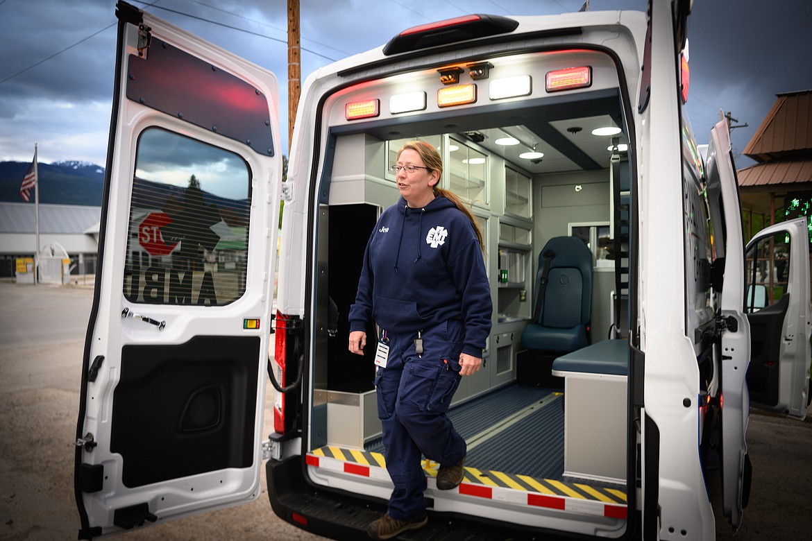 Plains Community Ambulance Service EMT Jen Fratzke on the town's new ambulance. (Tracy Scott/Valley Press)