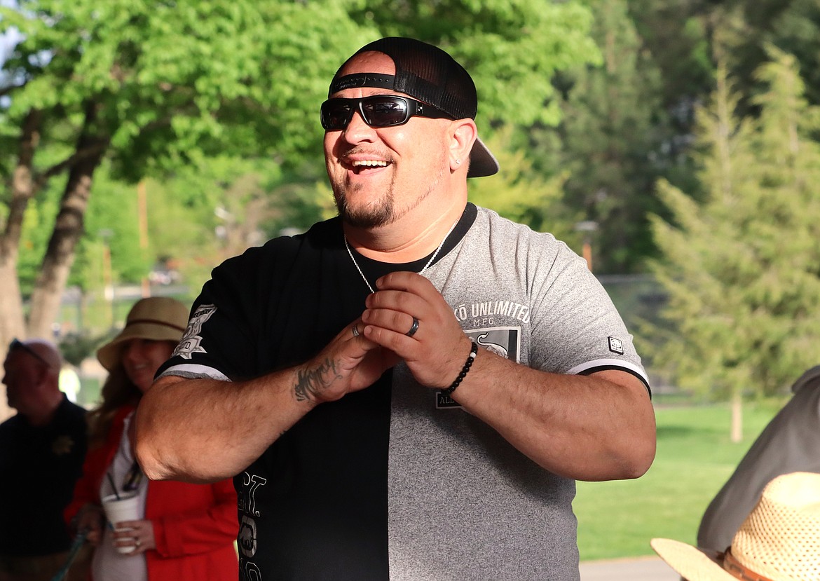 Brandon Brown smiles as he enjoys the Monday Night Dinner at McEuen Park.