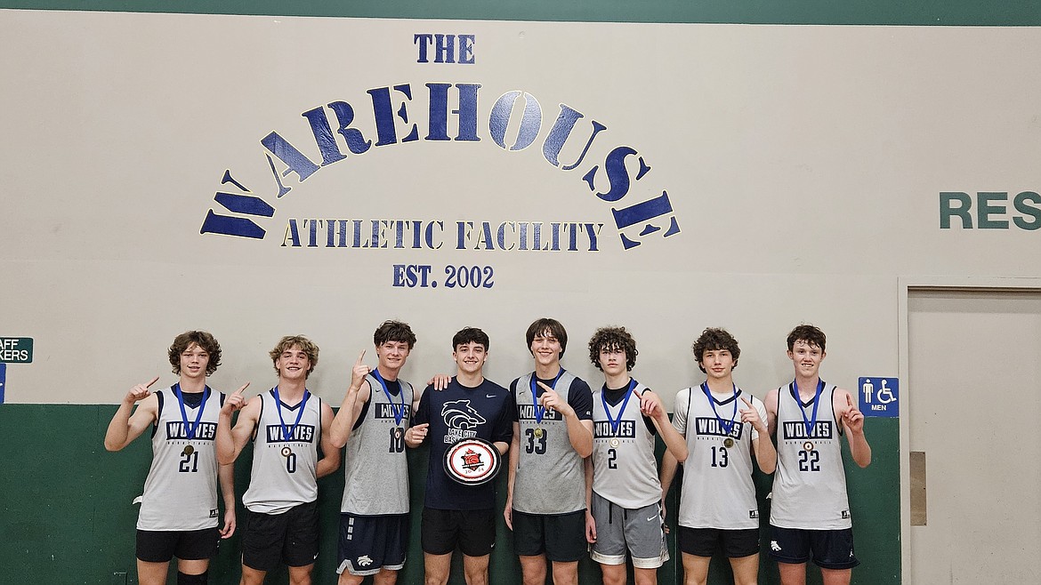 Courtesy photo
The North Idaho Impact high school AAU boys basketball team won the 19-team All-Star Division championship at the May Madness Shootout at the Warehouse in Spokane. The Impact defeated two Canadian varsity teams in the Final Four. From left are Ryan Salsbury, Caden Tony, Andy Everson, coach Braydn Arrieta, Marek Parson, Britton Johnston, Luka Joksimovic and Jackson Anderson.