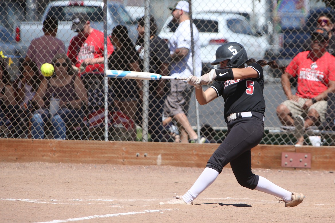 Othello junior Lovie Franco singles on a pitch during Saturday’s district tournament game against Selah.