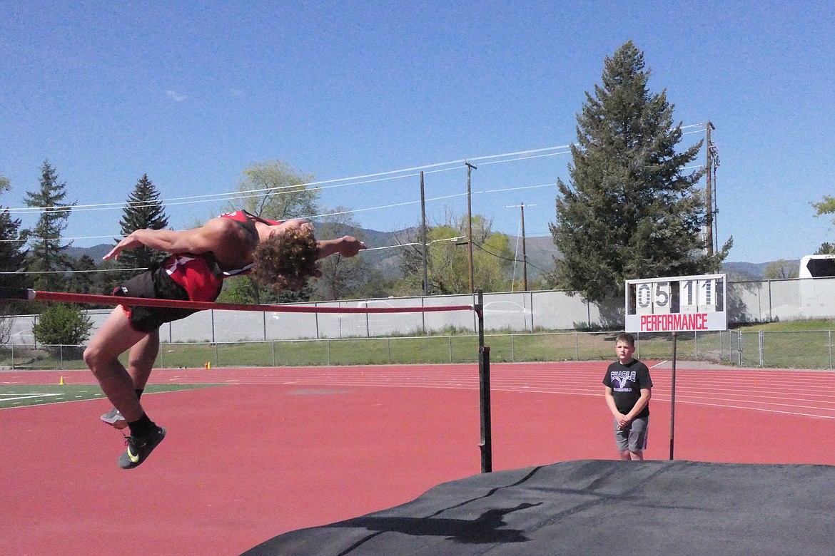 Noxon junior Ricky Willaims, who won the men's high jump title at the District 14C meet in Missoula, clears the bar. (Chuck Bandel/VP-MI)