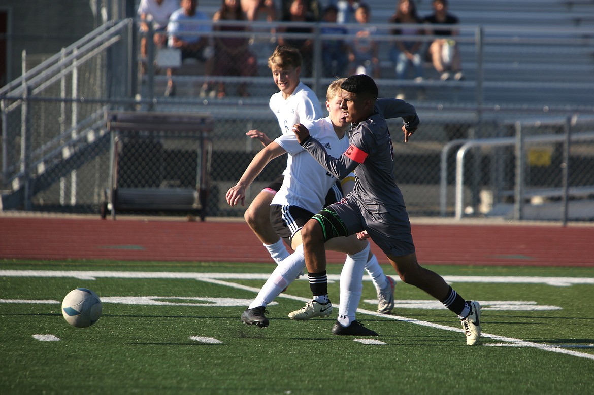 Wahluke senior Brian Herrera (8) rushes past the Royal defense, later scoring the game’s opening goal on a breakaway in the second minute of Saturday’s match.