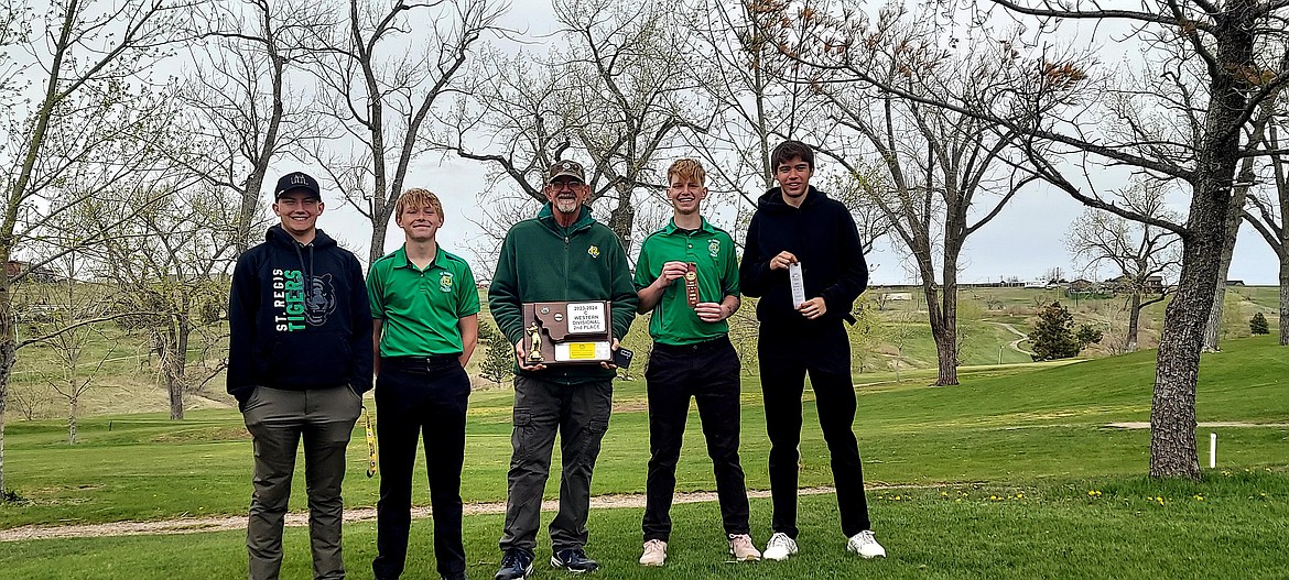 The St. Regis boys golf team poses with the second place trophy from this past week's Divisional Class C tourney in Great Falls. From right to left: Kaleb Park, Denver Thomas, Coach Park, Dillon Thomas and Jack Connolly.  Both Dillon and Connolly finished in the top 20 and qualified for the individual title. (Photo by Emily Park)