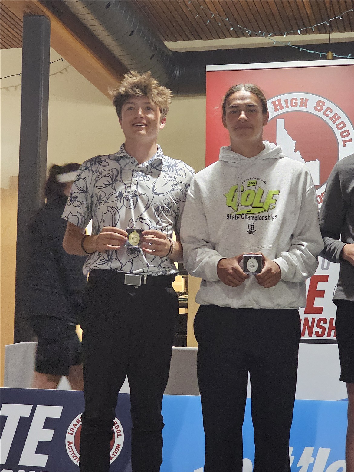 Courtesy photo
State 2A boys champion Palmer Coleman, left, of Priest River, and runner-up Beau Jones of Lakeside display their medals Tuesday at Circling Raven Golf Club in Worley.