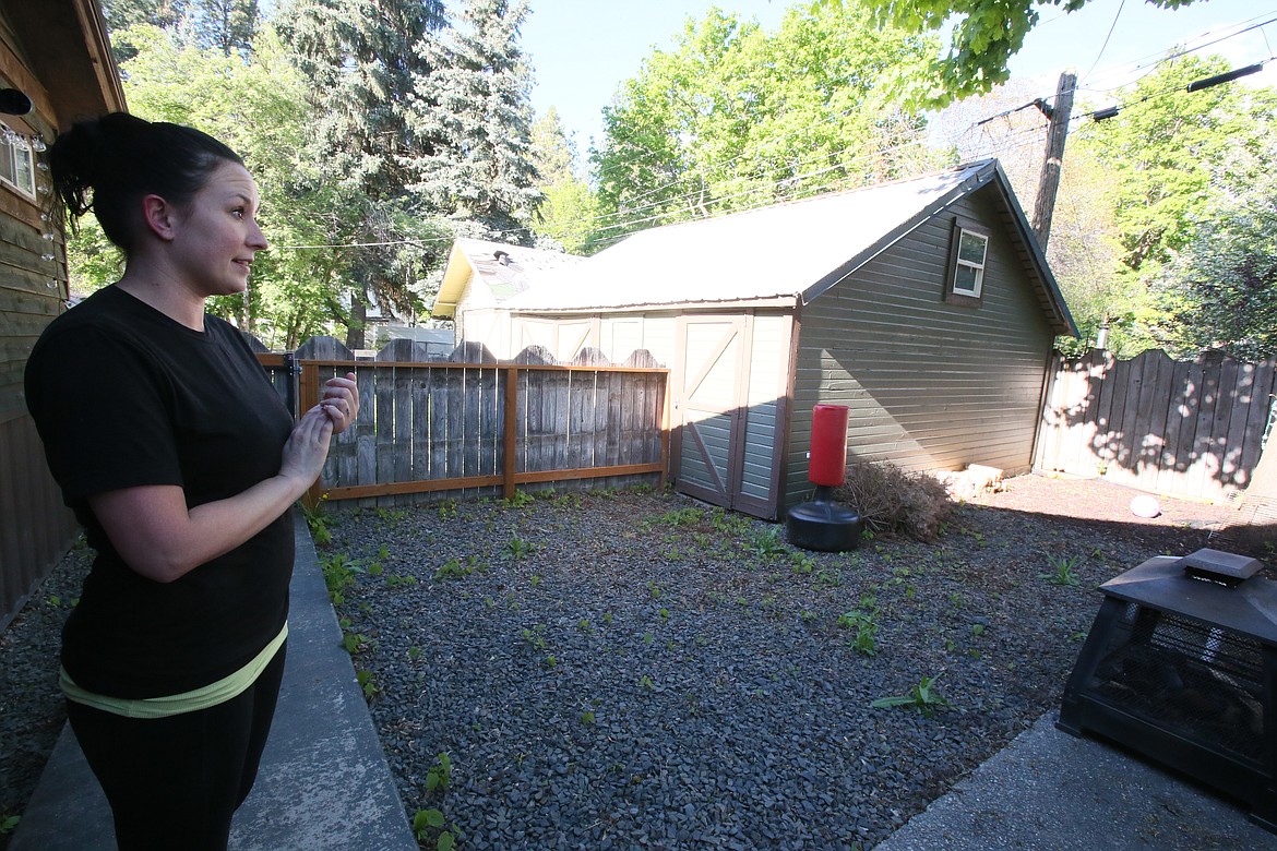 Heather Bischof is still in disbelief that through trauma, homelessness, her daughter's medical condition and more, she and her family have a happy home in Coeur d'Alene. She is seen on her back porch May 9.