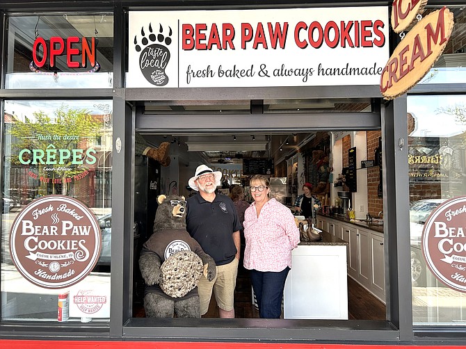 Ed and Lois Phillips, owners of Bear Paw Cookies Bakery and Crepes in Coeur d'Alene, stand in their Sherman Avenue shop.