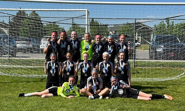 Courtesy photo
The Thorns North FC 11 Girls Academy soccer team took first place in the U13 Girls Gold Bracket at the Bill Eisenwinter Hot Shot Tournament last weekend. The Thorns started the tournament on Friday evening with a 0-0 draw against Washington East Surf SC G11 NPL. On Saturday the Thorns beat Flathead Valley United SC FVU 2011-PR 4-0. Brightyn Gatten started the game off with two goals, the second coming off an assist from Kenzie Dolan. In the second half Presley Moreau scored a goal for the Thorns and Ella Linder finished the game with a goal scored off a corner from Olivia Nusser. Sunday morning the Thorns once again faced Washington East Surf SC G11 NPL, winning 2-1. Presley Moreau scored the Thorns' 2 goals, including one on a penalty kick helping the Thorns head to the championship game, where the Thorns beat the Helena Youth Soccer Association G2011 Blue-PR 5-1. Striker Presley Moreau finished the game with 2 goals, including a goal off a corner kick from Olivia Nusser. Midfielders Riley Greene and Payton Brennan also scored goals, with Payton having 2 goals.  Keepers MacKenzie Dolan and Constance Ovendale held the opponents to only 2 goals for the weekend. In the front row from left are Kenzie Dolan, Brightyn Gatten and Payton Brennan; second row from left, Aubrey Sargent, Presley Moreau, Olivia Hynes, Riley Greene and Ella Linder; and back row from left, Olivia Nusser, Vivian Hartzell, Zoe Lemmon, Constance Ovendale, Kylie Lorona, Ava Langer and Emily Hacket. Not pictured is coach Mark Plakorus.