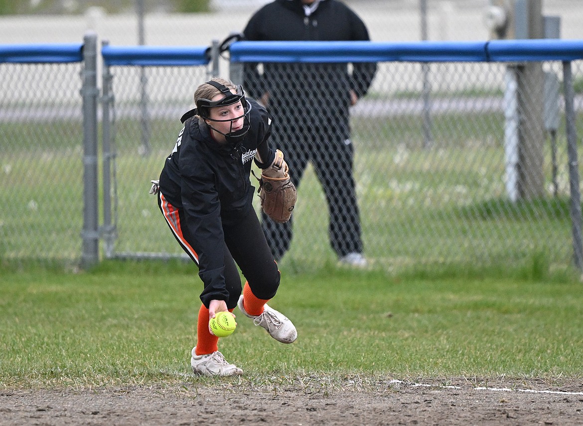 Ronan junior Hanna Lytton scoops up the ball during last week's game against Columbia Falls. (Chris Peterson/Hungry Horse News)